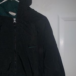 Black an green Nike pullover